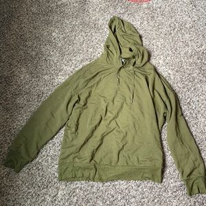 Universal Standard olive green hoodie.
